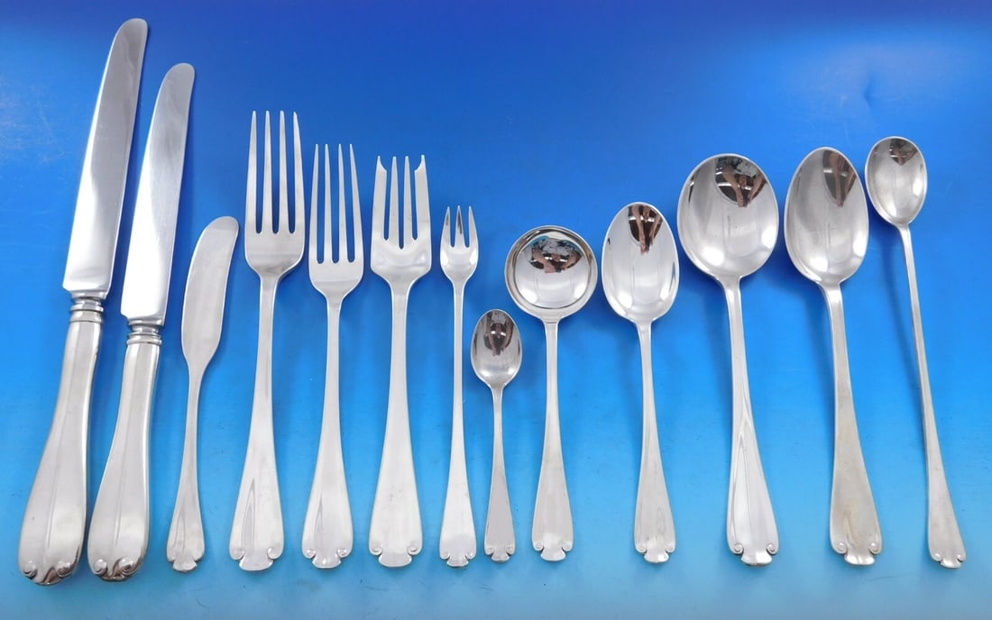 Tiffany & Co Flemish Sterling Silver Flatware Set 245 Pieces: Tiffany & Co Flemish Sterling Silver Flatware Set 245 Pieces Experience the elegance of Tiffany & Co.'s Flemish pattern with this stunning 245-piece sterling silver flatware set. Originally designed i
