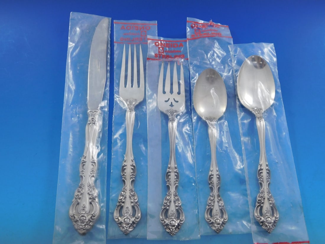 Oneida Michelangelo Sterling Silver Flatware Set for 12 60 pcs Unused with Storage Chest: Oneida Michelangelo Sterling Silver Flatware Set for 12 60 pcs Unused with Storage Chest Enhance your dining experience with the exquisite Michelangelo Sterling Silver Flatware Set by Oneida, designed