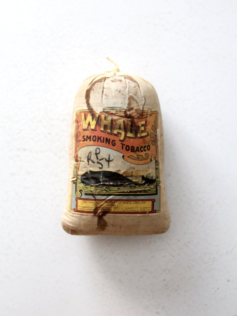 Rare Antique Whale Smoking Tobacco Drawstring Pouch from North Carolina: Rare Antique Whale Smoking Tobacco Drawstring Pouch from North Carolina Discover a piece of history with this authentic Antique Whale Smoking Tobacco cloth pouch, a rare artifact from the early 20th c