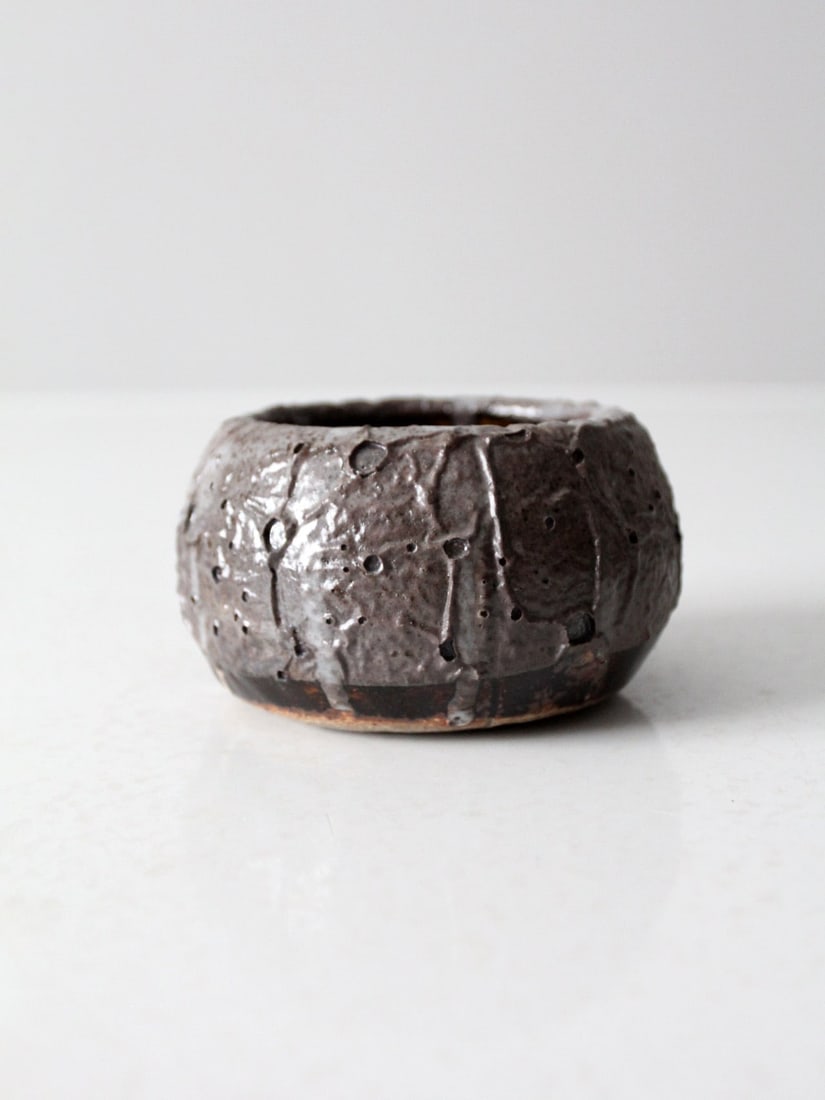 Signed Vintage Studio Pottery Bowl with Taupe Drip Glaze: Signed Vintage Studio Pottery Bowl with Taupe Drip Glaze This vintage studio pottery bowl showcases the artistry of handmade ceramics. It features a stunning rich taupe drip glaze with a unique crater