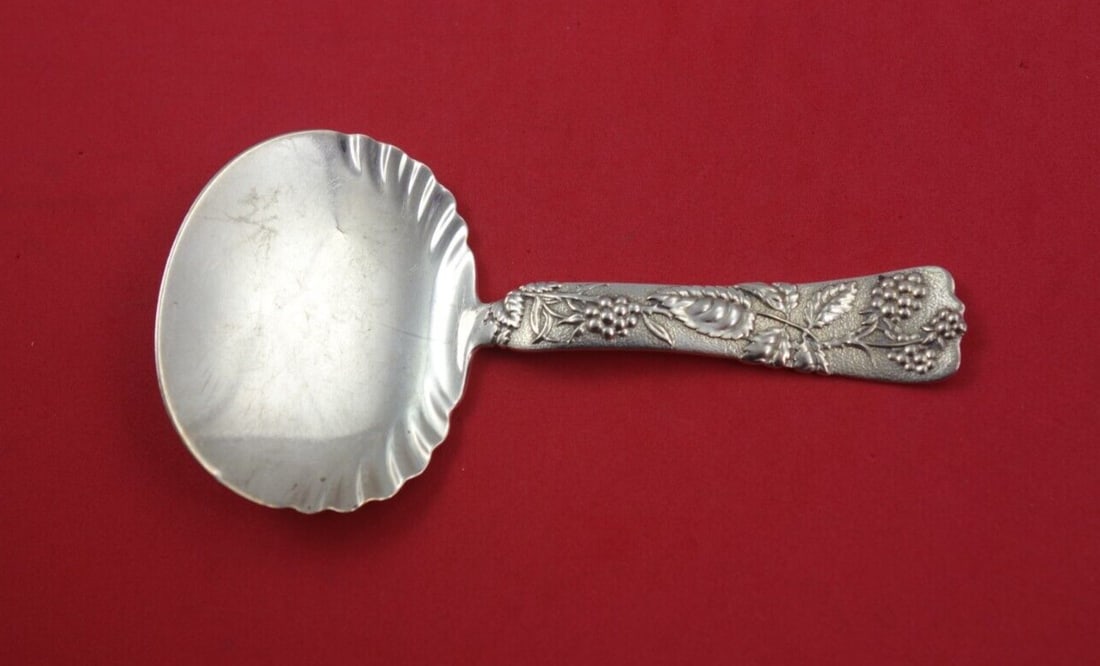 Tiffany & Co. Vine Sterling Silver Bon Bon Spoon with Raspberry Motif: Tiffany & Co. Vine Sterling Silver Bon Bon Spoon with Raspberry Motif This exquisite Sterling Silver Bon Bon Spoon from Tiffany & Co. features the elegant "Vine" pattern, showcasing a charming raspber