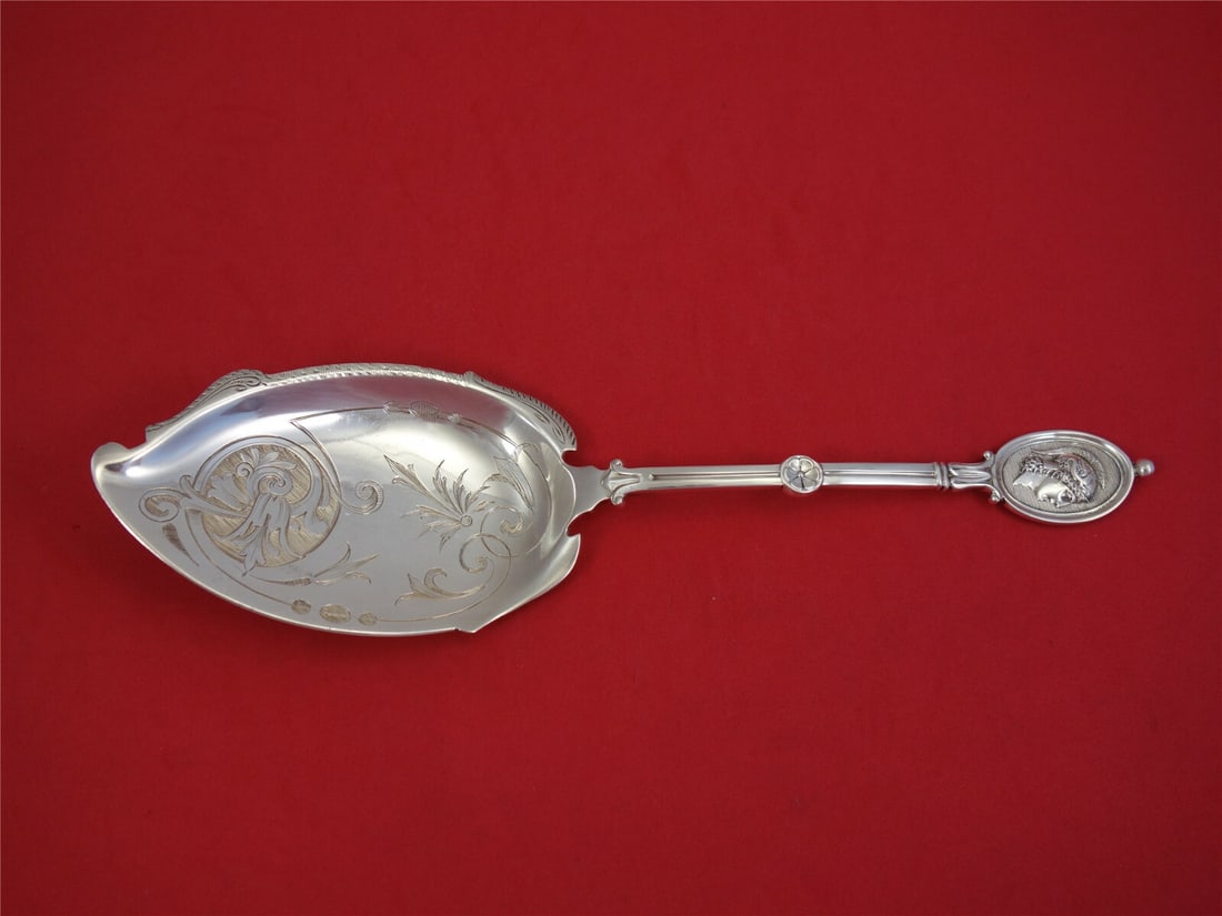 Wendt Medallion Sterling Silver Ice Cream Server 9 3/4": Wendt Medallion Sterling Silver Ice Cream Server 9 3/4" This exquisite ice cream server from the Medallion pattern by Wendt is crafted from high-quality sterling silver, reflecting the elegance of the