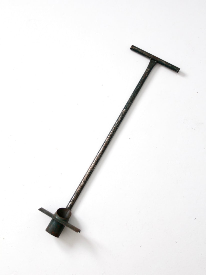 Vintage Green Metal Bulb Planter Gardening Tool 2 Inch Hole Cutter: Vintage Green Metal Bulb Planter Gardening Tool 2 Inch Hole Cutter This vintage bulb planter is an exquisite gardening tool that showcases a lovely patination with a rich green tone, making it an attr