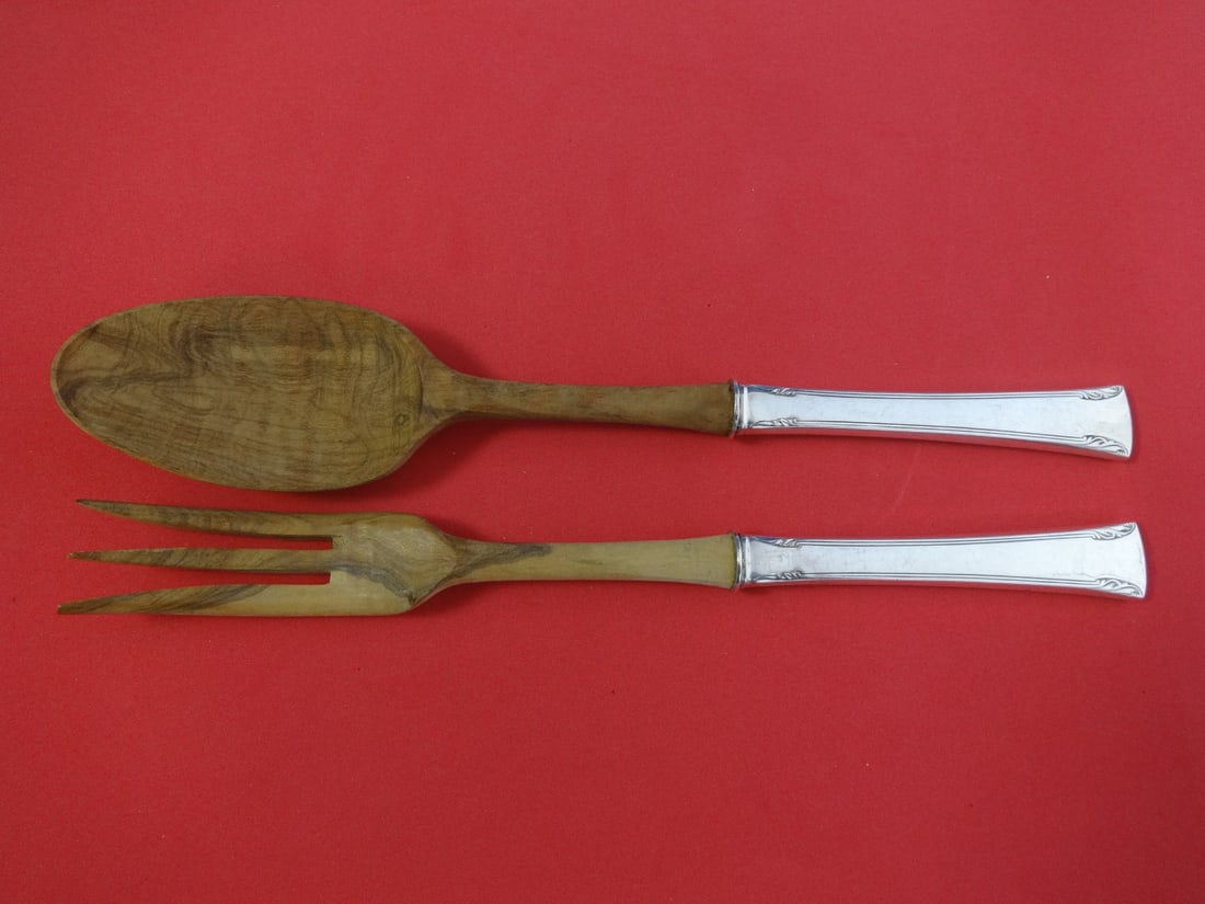 International Silver Serenity 2pc Sterling Silver Salad Serving Set with Wood Handles 11in: International Silver Serenity 2pc Sterling Silver Salad Serving Set with Wood Handles 11in Enhance your dining experience with this elegant Serenity salad serving set by International Sterling. This e