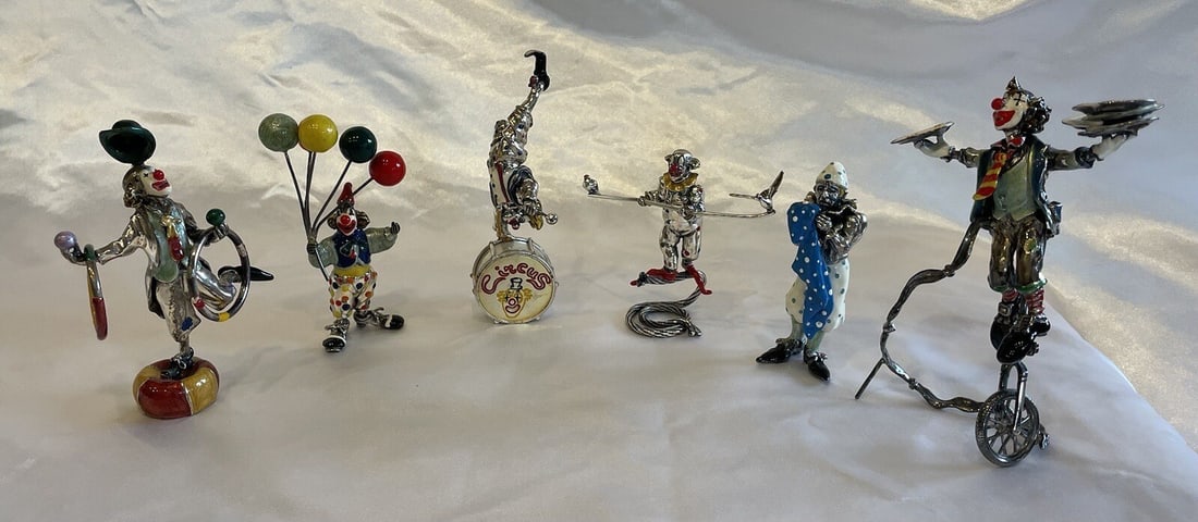 Exquisite 6 Piece Italian Enameled Sterling Silver Clown Figurine Set: Exquisite 6 Piece Italian Enameled Sterling Silver Clown Figurine Set Discover a magnificent 6-piece collection of Italian enameled sterling silver clown figurines, showcasing exquisite detail and cra