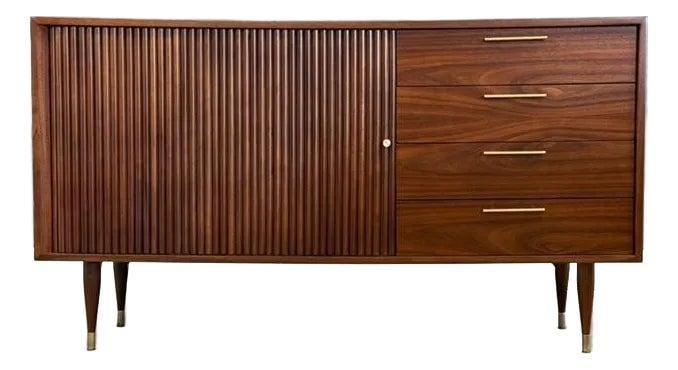 1960s Walnut Mid Century Modern Credenza with Brass Pulls: 1960s Walnut Mid Century Modern Credenza with Brass Pulls This stunning mid-century modern credenza showcases a refined walnut finish, exuding timeless elegance. Featuring four dovetail drawers adorne