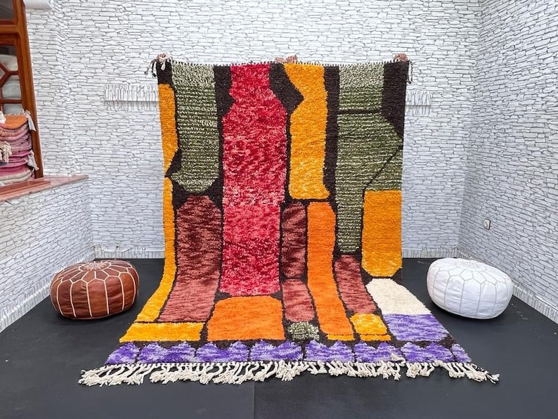 Authentic Colorful Handmade Moroccan Rug 100% Wool 9 x 5 Feet: Authentic Colorful Handmade Moroccan Rug 100% Wool 9 x 5 Feet Experience the elegance of this luxurious, soft, and colorful handmade rug, intricately handwoven in the Atlas Mountains. Crafted by skill
