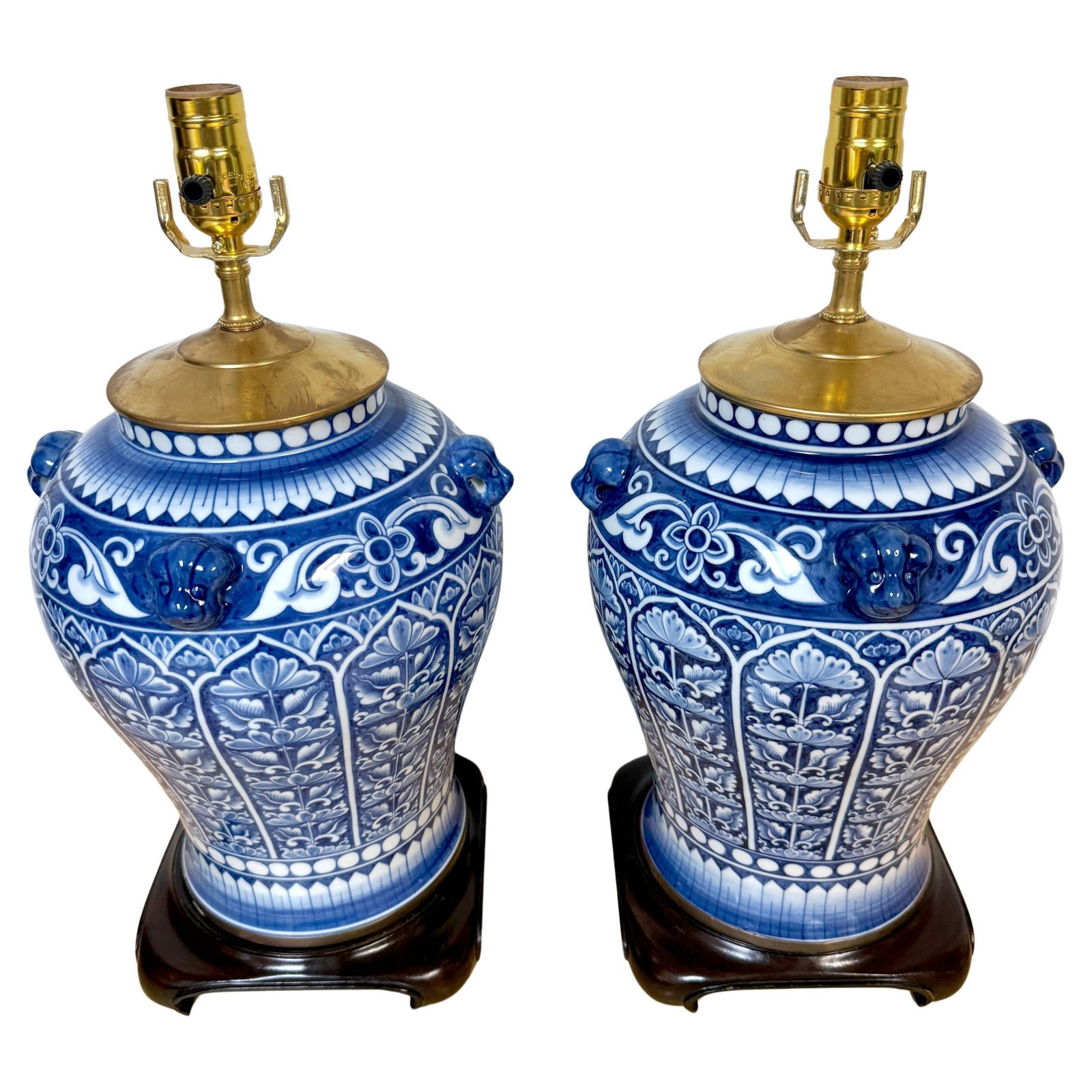 Set of 2 Chinese Export Blue White Porcelain Lamps with Foo Dog Medallions: Set of 2 Chinese Export Blue White Porcelain Lamps with Foo Dog Medallions This exquisite pair of Chinese Export Blue & White Porcelain Lamps embodies the elegance of traditional craftsmanship. Each l
