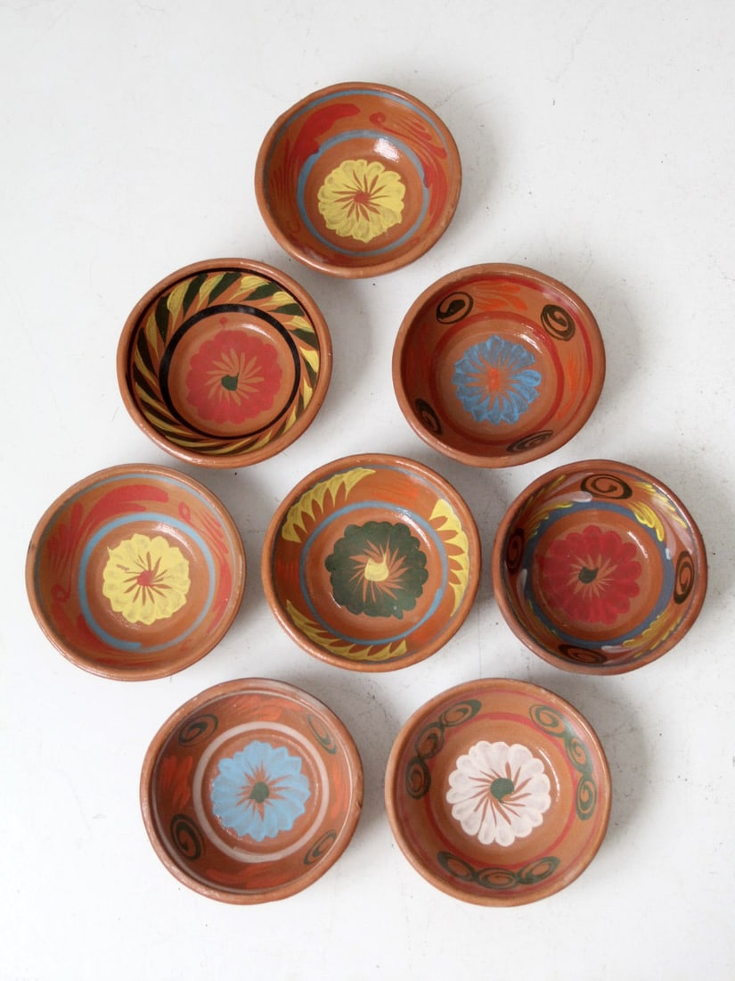 Vintage Hand Painted Mexican Terra Cotta Serving Bowls Set of 8: Vintage Hand Painted Mexican Terra Cotta Serving Bowls Set of 8 Enhance your dining experience with this exquisite set of eight vintage Mexican terra cotta serving bowls. Each bowl is hand-painted wit