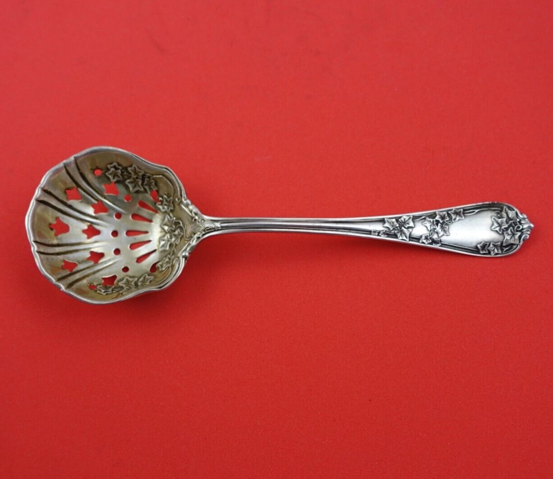 Ivy International Sterling Silver Sugar Sifter 5 1/4 Heirloom Serving Piece: Ivy International Sterling Silver Sugar Sifter 5 1/4 Heirloom Serving Piece This exquisite sugar sifter from the Ivy pattern by International Sterling is a stunning addition to any table setting. Craf
