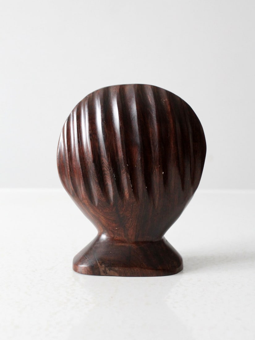 Ironwood Napkin Holder with Seashell Motif Vintage Coastal Decor: Ironwood Napkin Holder with Seashell Motif Vintage Coastal Decor This vintage seashell-shaped napkin holder is crafted from dark brown ironwood, featuring a sculptural shell design and natural wood gr