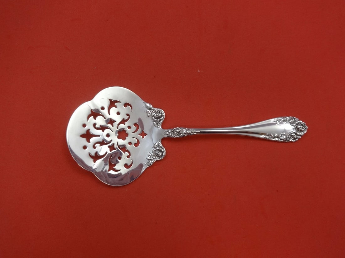 Wallace Rose Sterling Silver Cucumber Server 6 1/4 Inch Fancy Piercing: Wallace Rose Sterling Silver Cucumber Server 6 1/4 Inch Fancy Piercing This exquisite cucumber server is part of the renowned Rose pattern by Wallace, crafted from high-quality sterling silver. Measur