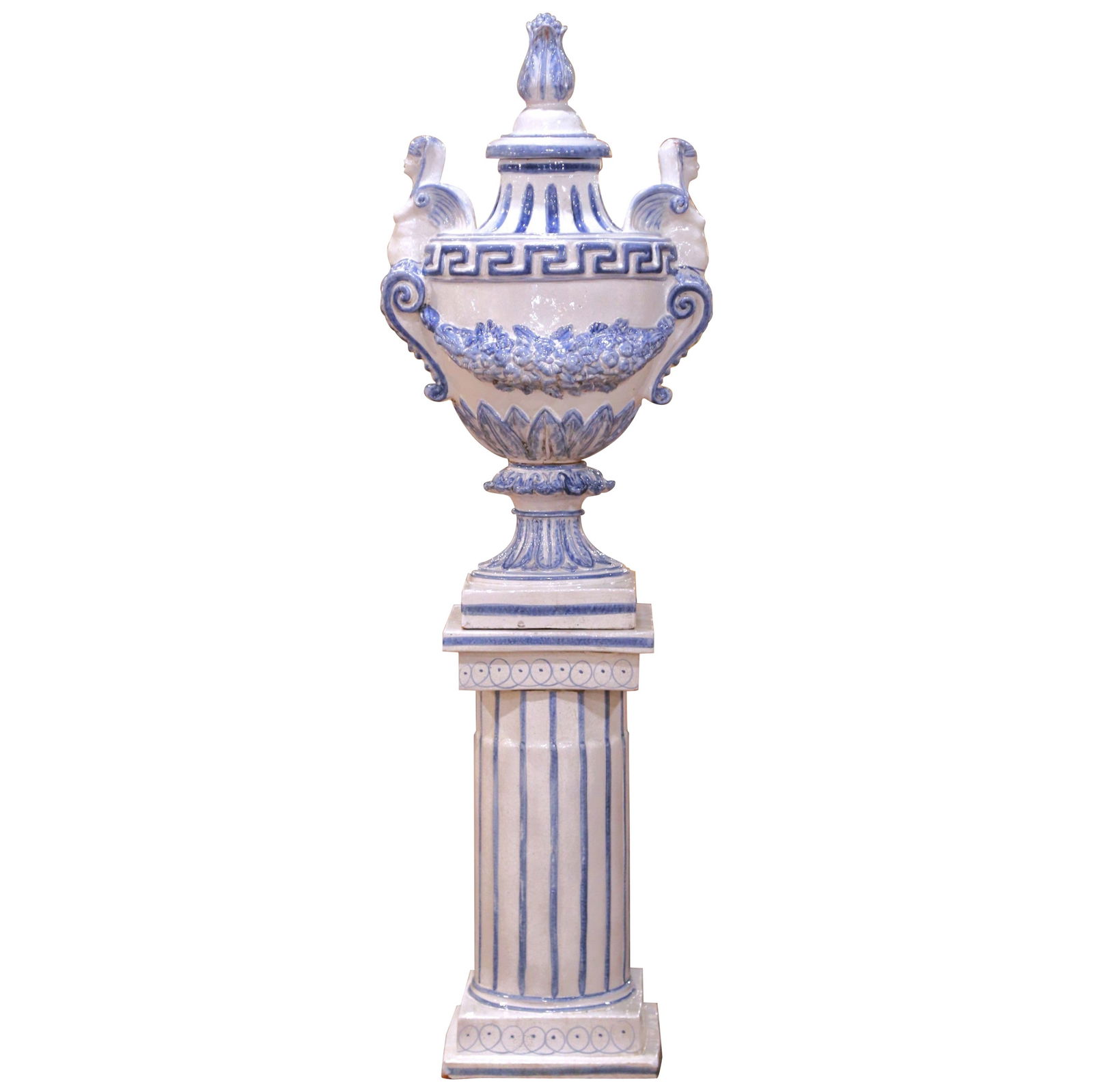 Neoclassical French Blue and White Faience Urn with Pedestal circa 1920: Neoclassical French Blue and White Faience Urn with Pedestal circa 1920 This early 20th century French faience urn on pedestal showcases Neoclassical style with its blue and white tin-glazed ceramic c