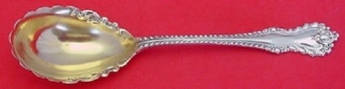 Dominick & Haff Mazarin Sterling Silver Preserve Spoon Goldwashed 7.25": Dominick & Haff Mazarin Sterling Silver Preserve Spoon Goldwashed 7.25" This exquisite Mazarin serving spoon by Dominick & Haff is a stunning piece crafted in sterling silver and features a goldwashed
