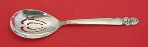 Frank Whiting Rose of Sharon Sterling Silver Ice Spoon 9 1/8": Frank Whiting Rose of Sharon Sterling Silver Ice Spoon 9 1/8" This exquisite serving spoon features the elegant "Rose of Sharon" pattern by Frank Whiting. Crafted from high-quality sterling silver, th