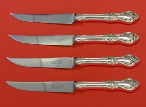 Oneida Afterglow Sterling Silver Steak Knife Set 4pc 8.5" Custom: Oneida Afterglow Sterling Silver Steak Knife Set 4pc 8.5" Custom Enhance your dining experience with this exquisite Afterglow by Oneida Sterling Silver Steak Knife Set. This custom-made set features f