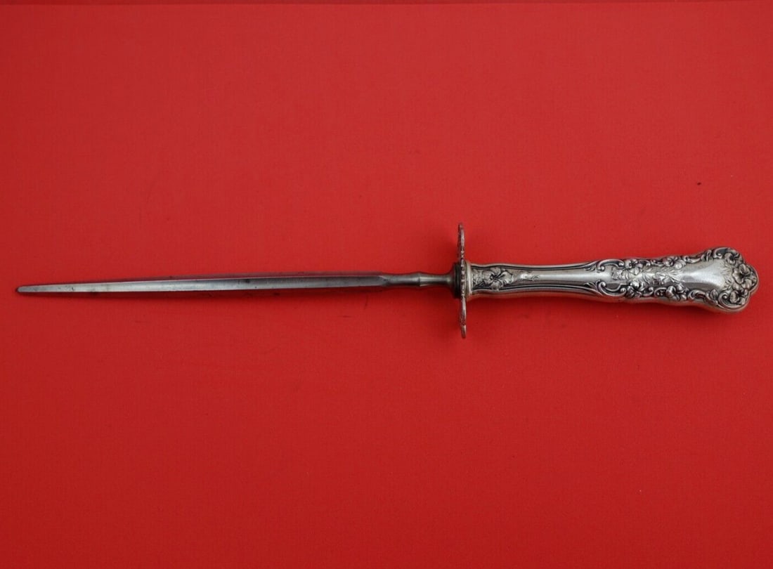 International Sterling Silver Pansy Roast Carving Hone 13 1/4 inches: International Sterling Silver Pansy Roast Carving Hone 13 1/4 inches This exquisite Roast Carving Hone features the elegant Pansy pattern by International, crafted from sterling silver with a hollow h