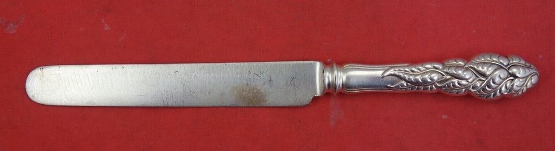 Tiffany and Co Ailanthus Sterling Silver Blunt Knife 9 1/4": Tiffany and Co Ailanthus Sterling Silver Blunt Knife 9 1/4" This exquisite blunt knife from the Ailanthus pattern by Tiffany and Co. is crafted from high-quality sterling silver. Measuring 9 1/4 inche