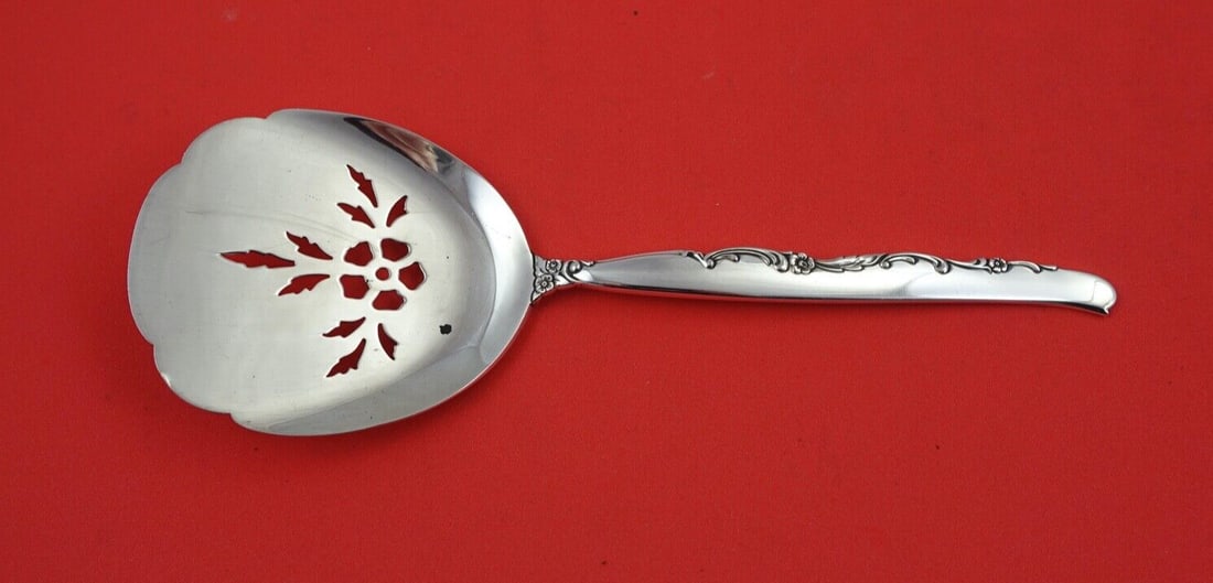 Oneida Flower Lane Sterling Silver Tomato Server 7.5 Inch: Oneida Flower Lane Sterling Silver Tomato Server 7.5 Inch Enhance your dining experience with this exquisite Flower Lane Tomato Server by Oneida, crafted from high-quality sterling silver. This elegan