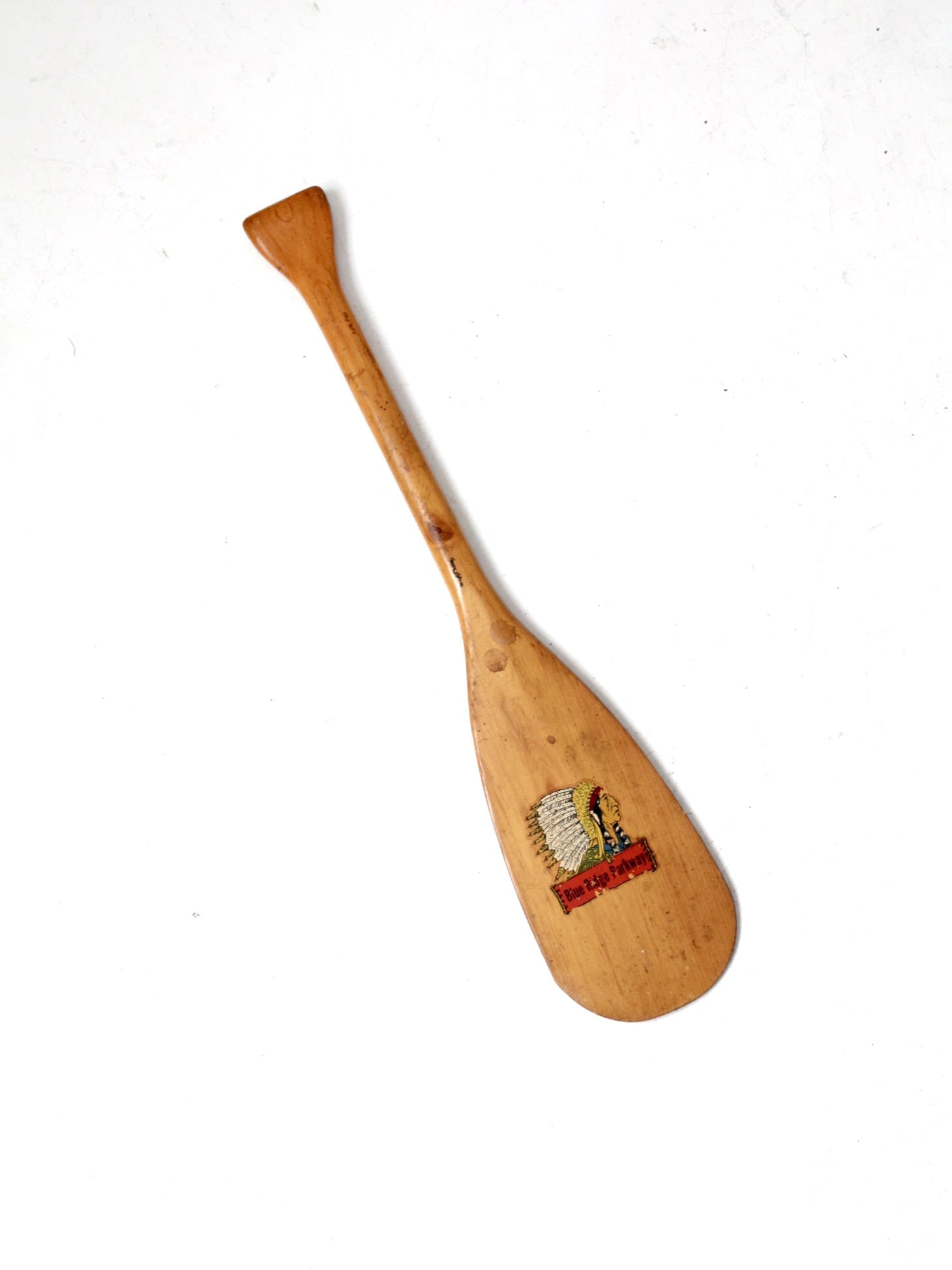 Rustic Vintage Blue Ridge Parkway Canoe Paddle with Native American Emblem: Rustic Vintage Blue Ridge Parkway Canoe Paddle with Native American Emblem Embrace rustic Americana with this Vintage Blue Ridge Parkway Paddle, featuring a hand-painted Native American chief bust emb