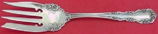 International Silver Wild Rose Beef Fork 6.5 Sterling Silver: International Silver Wild Rose Beef Fork 6.5 Sterling Silver This exquisite beef fork, measuring 6 1/2", is crafted from high-quality sterling silver in the elegant Wild Rose pattern, also known as Ro