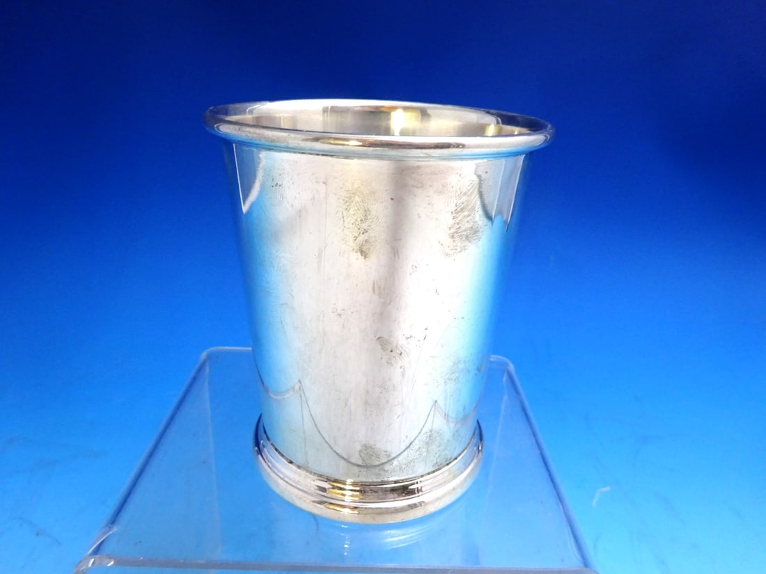 Sterling Silver Julep Cup by Preisner 4 Inch Tall 4.5 Troy Ounce: Sterling Silver Julep Cup by Preisner 4 Inch Tall 4.5 Troy Ounce This Preisner mint julep cup is crafted from sterling silver (.925) and features a classic design. The cup measures 4 inches tall by 3