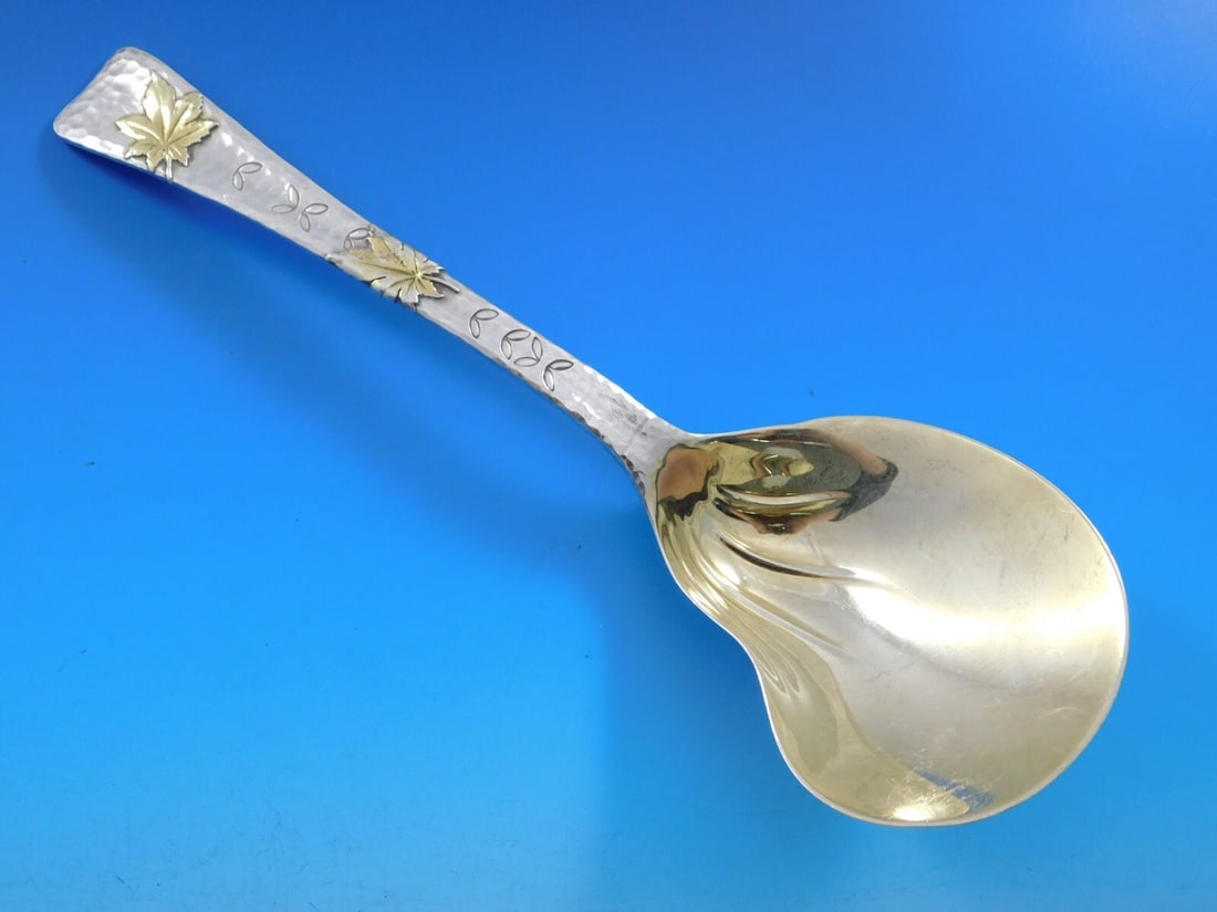 Tiffany & Co. Lap Over Edge Sterling Silver Berry Spoon with Gold-Washed Bowl: Tiffany & Co. Lap Over Edge Sterling Silver Berry Spoon with Gold-Washed Bowl Discover a rare vintage piece from Tiffany & Co. with this Lap Over Edge sterling silver kidney berry spoon, crafted betwe
