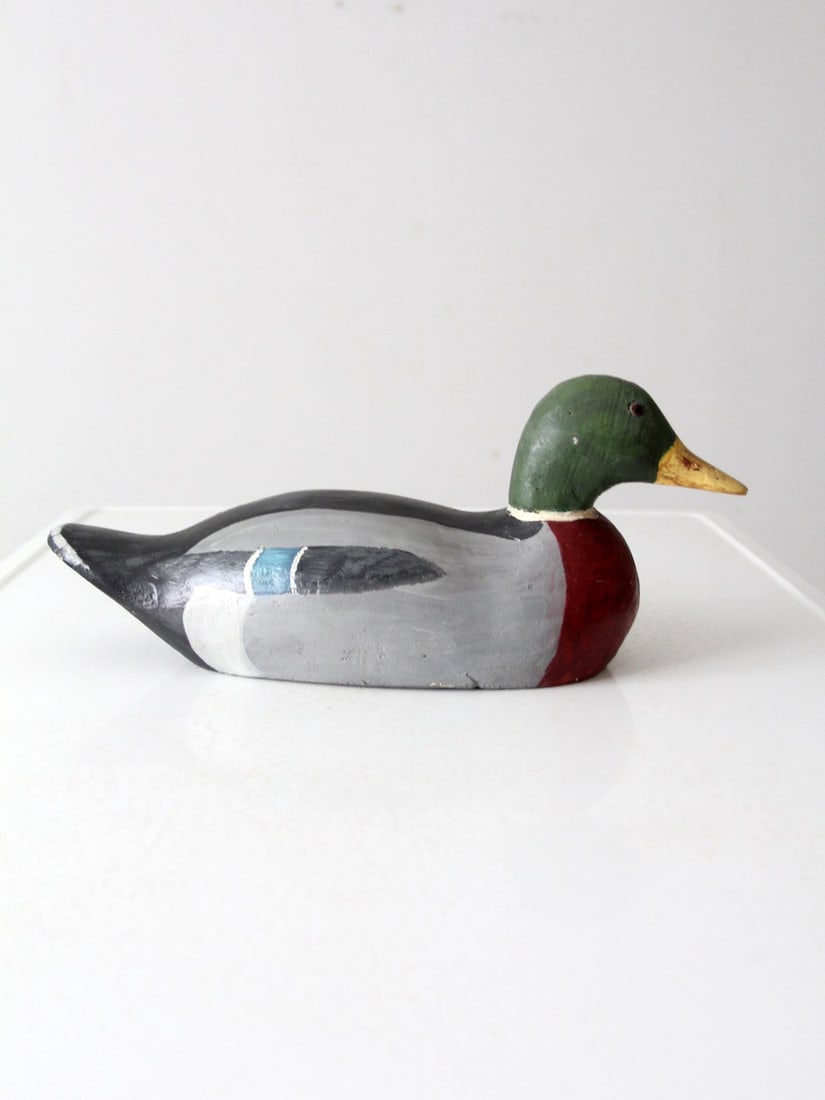 Hand-Painted Vintage Mallard Duck Wood Decoy 6.5 in: Hand-Painted Vintage Mallard Duck Wood Decoy 6.5 in This vintage wooden mallard duck decoy is expertly hand-painted to replicate a drake, featuring a beautifully carved form and lightly stylized paint