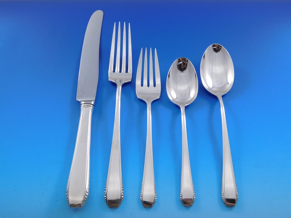 Towle Cascade Sterling Silver Flatware Set 40 pcs for 8 with Storage Chest: Towle Cascade Sterling Silver Flatware Set 40 pcs for 8 with Storage Chest Elevate your dining experience with the Cascade Sterling Silver Flatware Set by Towle, designed to serve 8. This exquisite 40