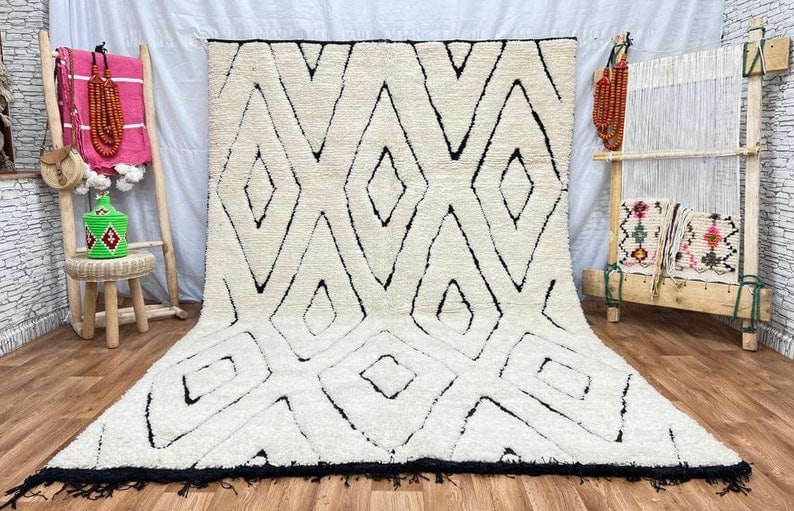 Authentic Handwoven Soft White Engraved Rug from Morocco: Authentic Handwoven Soft White Engraved Rug from Morocco Experience the charm of traditional craftsmanship with this Authentic Soft White Engraved Rug. Handwoven by local Berber women weavers in the A