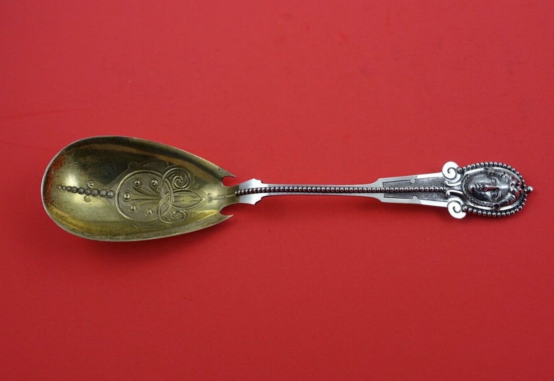 Wood & Hughes Medallion Sterling Silver Berry Spoon 9 Inch C Monogram: Wood & Hughes Medallion Sterling Silver Berry Spoon 9 Inch C Monogram This exquisite berry spoon features the Medallion pattern by Wood & Hughes, crafted from high-quality sterling silver. Measuring 9