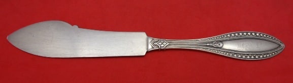 Whiting Indian Sterling Silver Fish Knife Flat Handle 7 1/4": Whiting Indian Sterling Silver Fish Knife Flat Handle 7 1/4" This exquisite fish knife features a flat handle design and is crafted entirely from sterling silver. Made by Whiting, this piece is part o