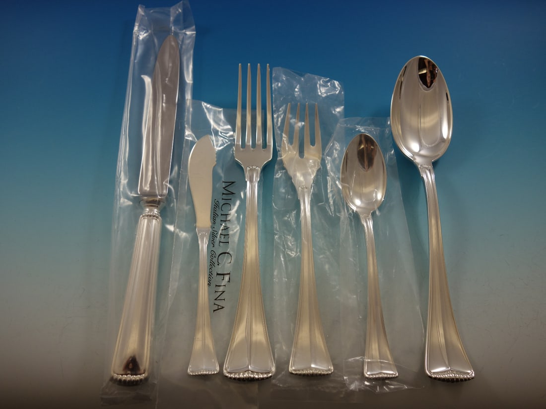 Greggio Fiesole Sterling Silver Flatware Set 56 Pcs with Storage Chest: Greggio Fiesole Sterling Silver Flatware Set 56 Pcs with Storage Chest Presenting the exquisite Fiesole Sterling Silver Flatware Set by Greggio, a stunning collection meticulously crafted in Italy. Th