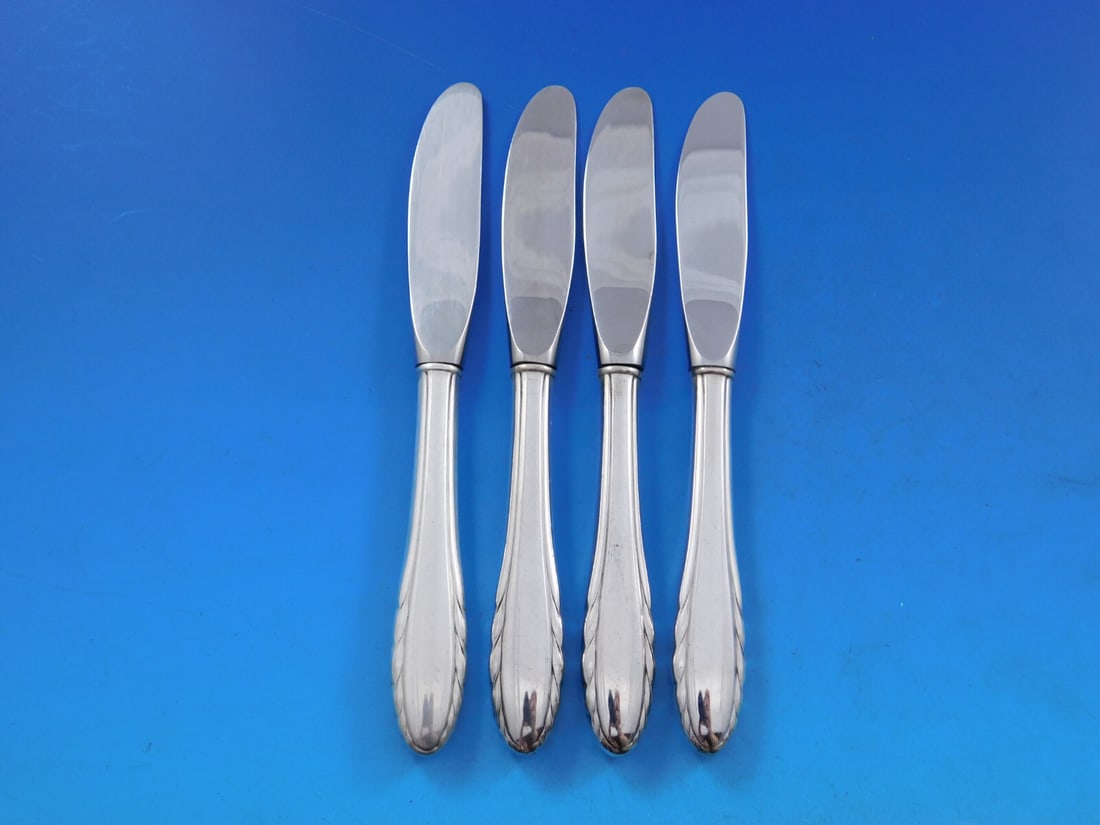 Gorham Lyric Sterling Silver Butter Spreaders Set of 4 Modern Design 6 3/8": Gorham Lyric Sterling Silver Butter Spreaders Set of 4 Modern Design 6 3/8" This exquisite set of four butter spreaders from the Lyric pattern by Gorham showcases a blend of elegant design and practic