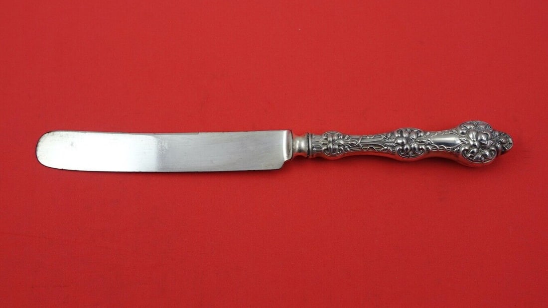 Alvin Gorham Old Orange Blossom Sterling Silver Dinner Knife 9 7/8": Alvin Gorham Old Orange Blossom Sterling Silver Dinner Knife 9 7/8" Experience the elegance of dining with the Old Orange Blossom dinner knife, a classic piece crafted by Alvin and Gorham. This stunni