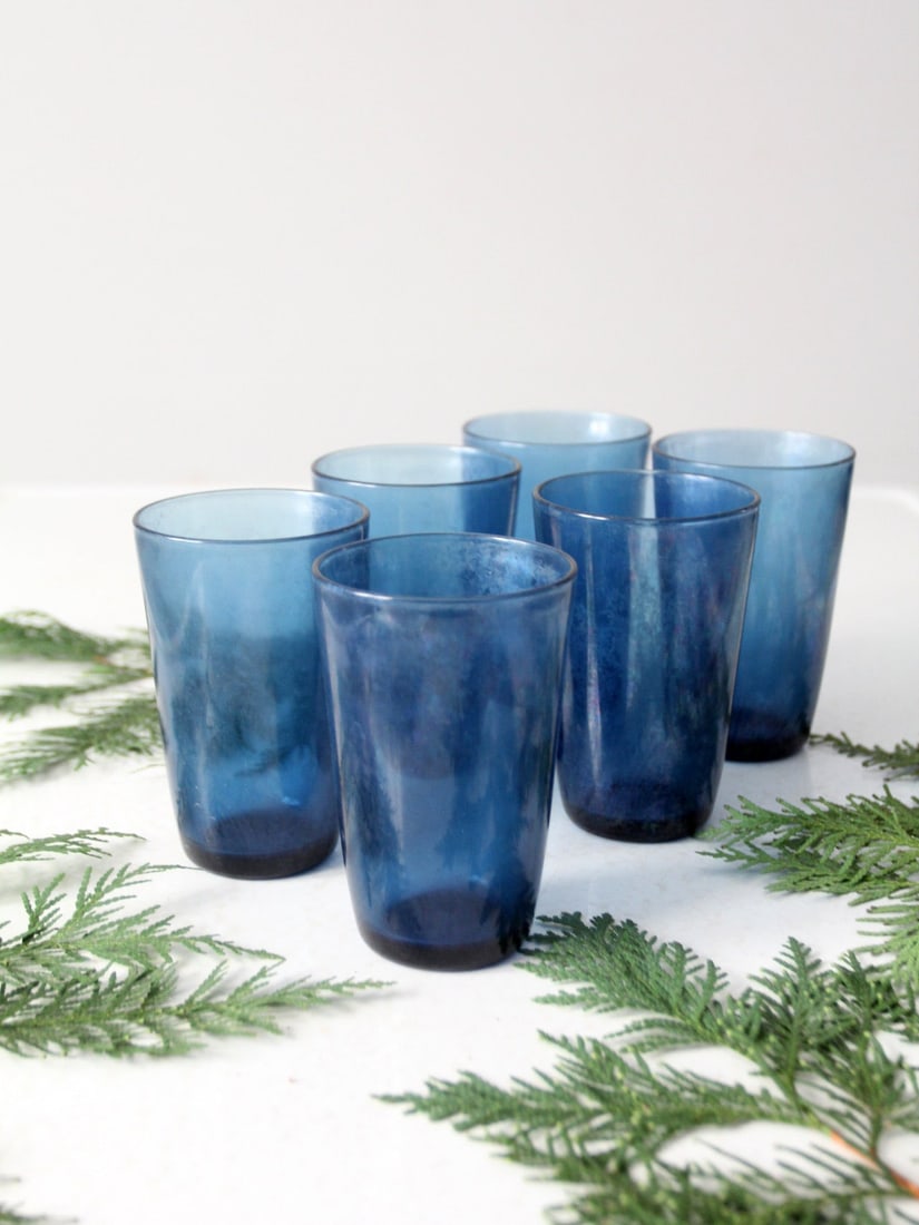 Vereco Vintage Set of 6 Iridescent Blue Tumblers: Vereco Vintage Set of 6 Iridescent Blue Tumblers Enhance your dining experience with this set of six vintage Vereco France blue glass tumblers. These elegant tumblers feature a shimmering iridescent f