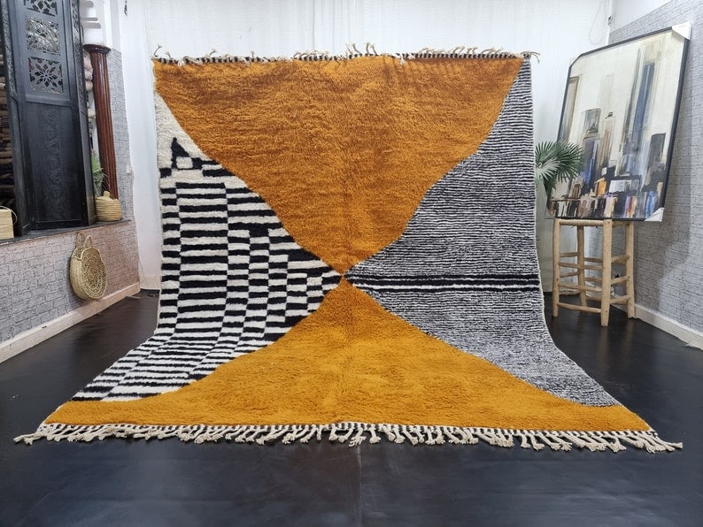 Authentic Handmade Moroccan Berber Wool Rug 9.84 x 6.56 Feet: Authentic Handmade Moroccan Berber Wool Rug 9.84 x 6.56 Feet Experience the beauty of authentic craftsmanship with this stunning handwoven Moroccan Berber wool rug. Created by local Berber women weave