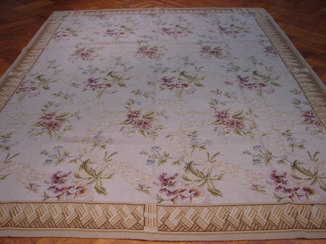 8 x 10 Light Purple Handmade Needlepoint Rug with Spring Design: 8 x 10 Light Purple Handmade Needlepoint Rug with Spring Design Free continental US Shipping Add a touch of elegance to your home with the 8 x 10 Light Purple Double Knot Spring Needlepoint Rug. This