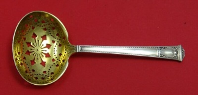 Tiffany & Co San Lorenzo Sterling Silver Sugar Sifter 5 1/4" Gold Washed Flower Design: Tiffany & Co San Lorenzo Sterling Silver Sugar Sifter 5 1/4" Gold Washed Flower Design Introducing the exquisite San Lorenzo Sugar Sifter by Tiffany & Co., crafted from fine sterling silver. This eleg