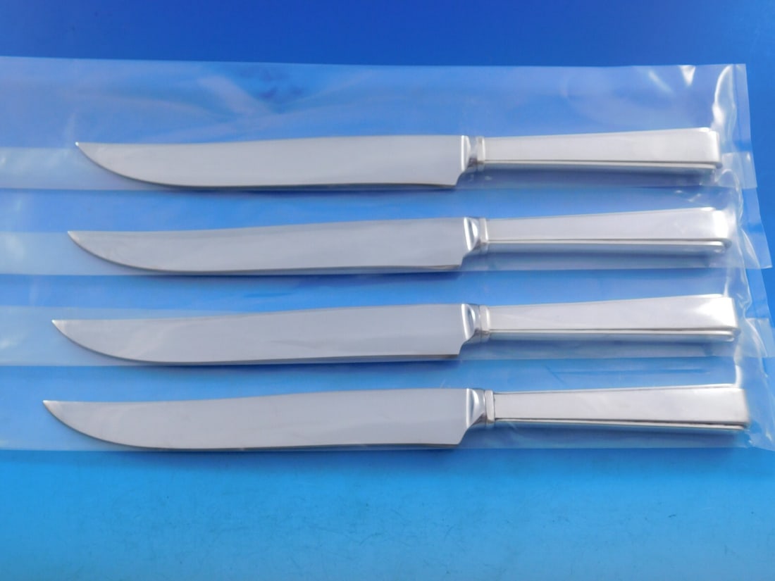 Lunt Sterling Silver Modern Classic 4-Piece Texas Sized Steak Knife Set 9 7/8": Lunt Sterling Silver Modern Classic 4-Piece Texas Sized Steak Knife Set 9 7/8" Elevate your dining experience with this exquisite 4-piece Steak Knife Set from the Modern Classic collection by Lunt. Cr