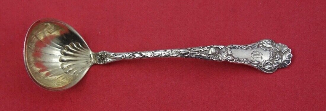 Gorham Poppy Sterling Silver Sauce Ladle 5 Inch Shell Bowl: Gorham Poppy Sterling Silver Sauce Ladle 5 Inch Shell Bowl Elevate your dining experience with this exquisite Poppy pattern sauce ladle by Gorham. Crafted from sterling silver, this ladle features a l