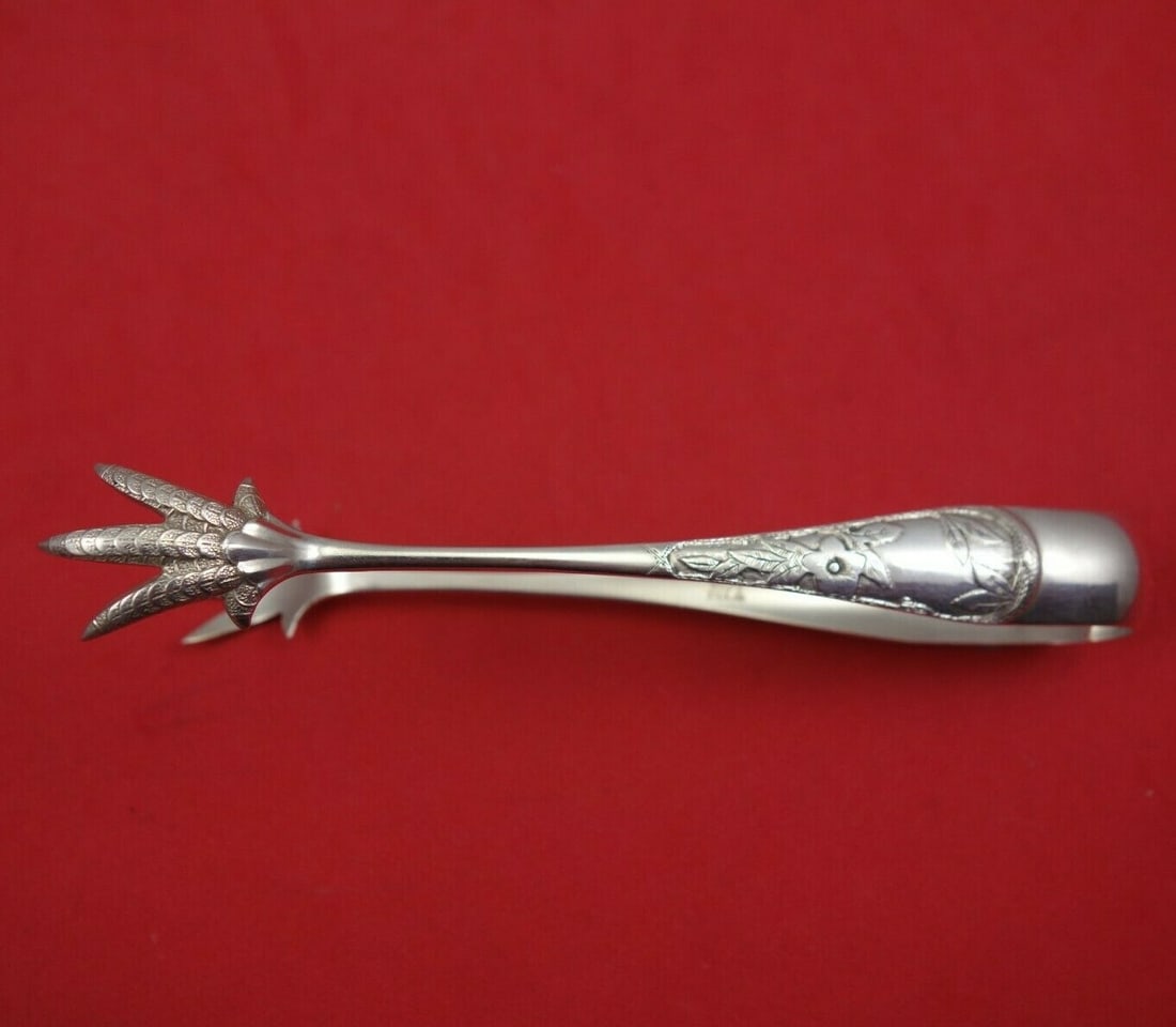 Gorham Clematis Sterling Silver Sugar Tong Large 5 1/4 Inch Antique: Gorham Clematis Sterling Silver Sugar Tong Large 5 1/4 Inch Antique This exquisite serving piece is a large sugar tong from the renowned Clematis pattern by Gorham, crafted from high-quality sterling