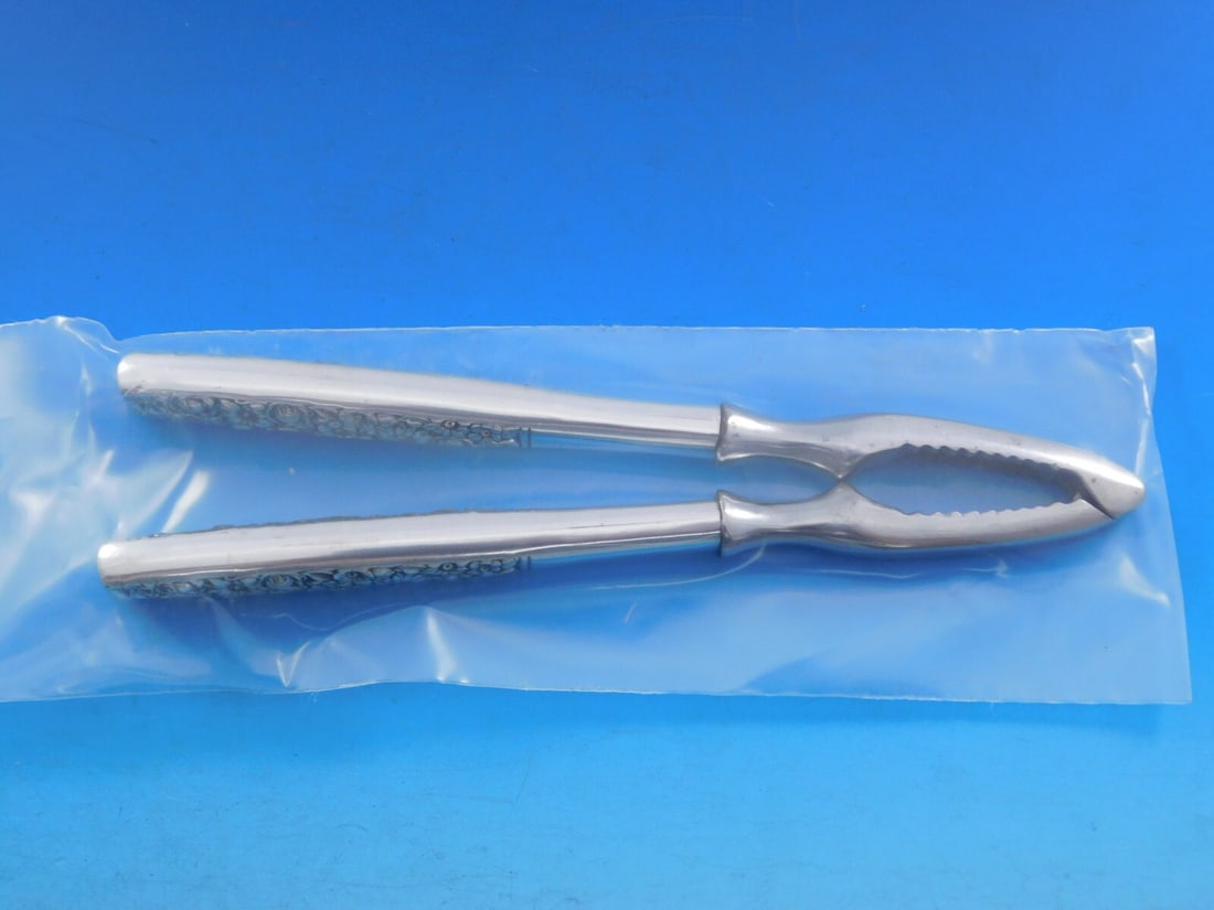 Towle Contessina Sterling Silver Nut Cracker 7 3/4" Custom Made: Towle Contessina Sterling Silver Nut Cracker 7 3/4" Custom Made Elevate your dining experience with this exquisite nut cracker from the Contessina pattern by Towle. Crafted from sterling silver, this