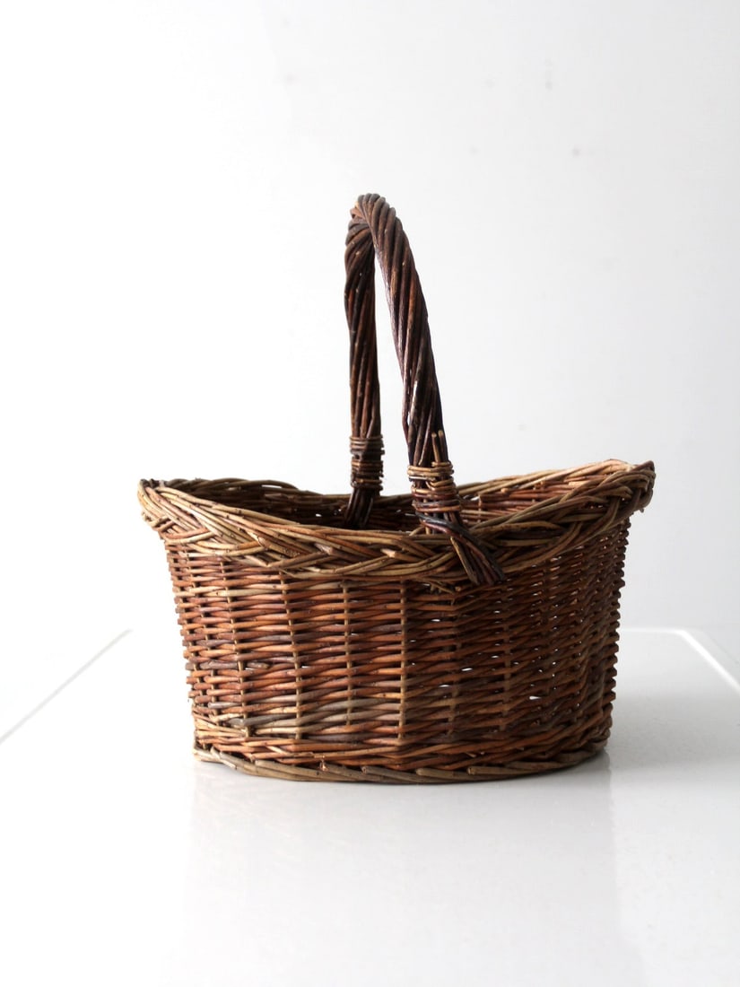 Vintage Wicker Basket with Braided Rim and Twisted Handle (1 of 11)