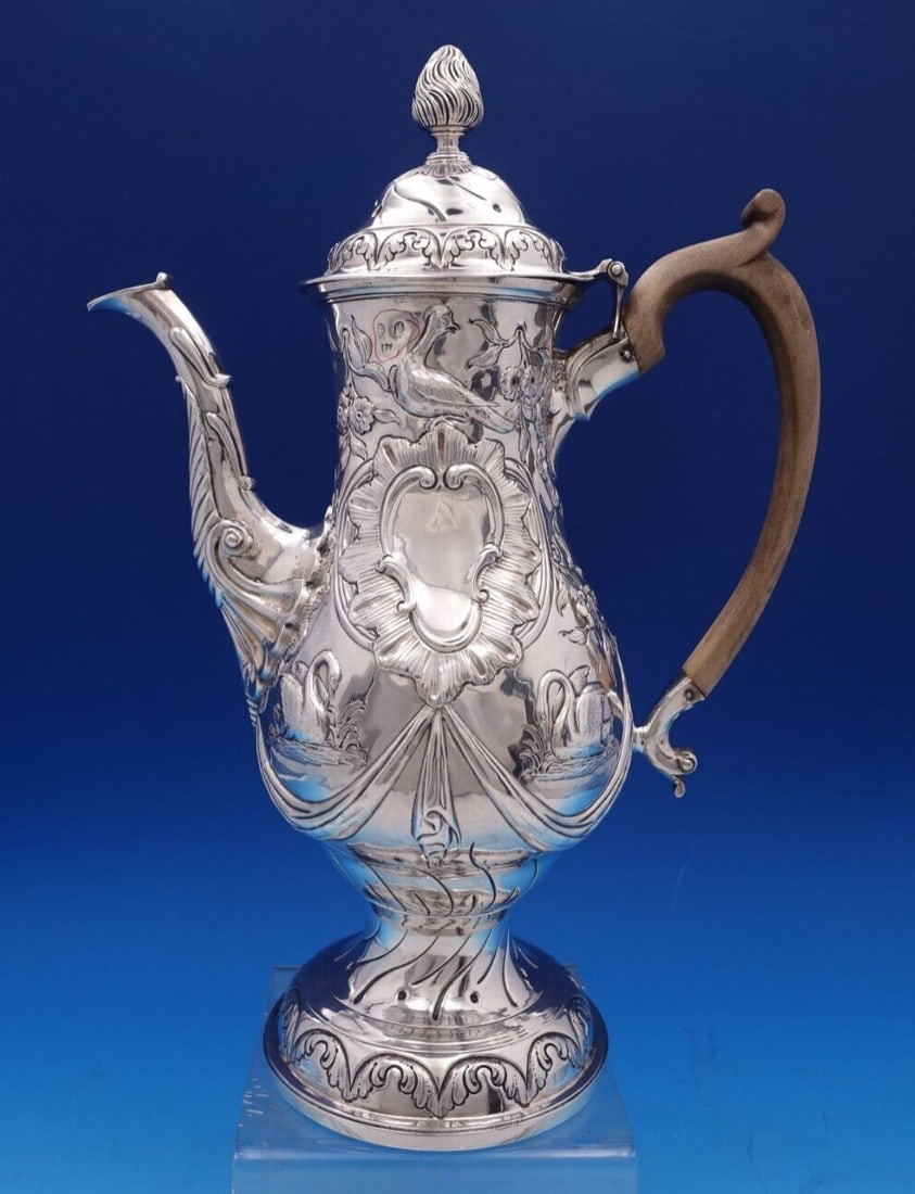 1775 Irish Dublin Sterling Silver Coffee Pot with Swans and Swags: 1775 Irish Dublin Sterling Silver Coffee Pot with Swans and Swags This exquisite coffee pot, crafted in Dublin in 1775, showcases the artistry of early Irish sterling silver. The 18th-century piece fe