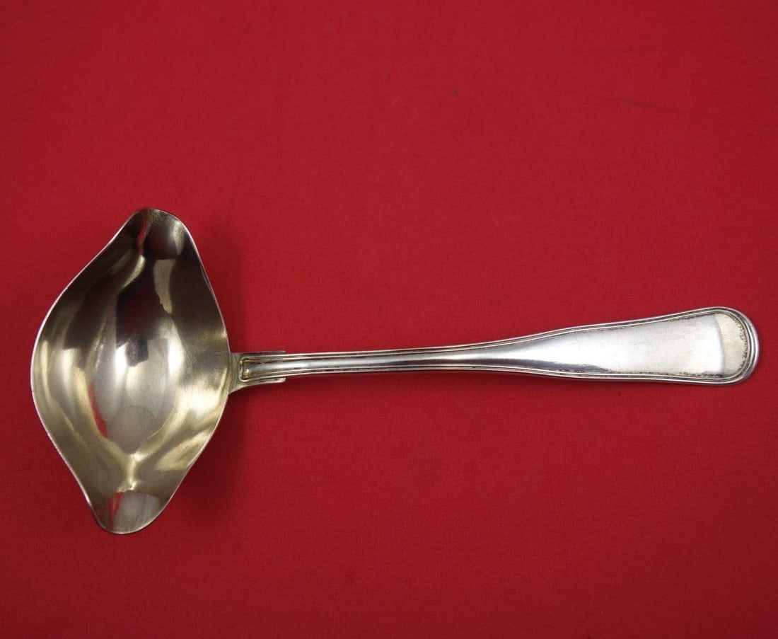 Sondergaard Old Danish Sterling Silver Gravy Ladle 7.25" with Spout: Sondergaard Old Danish Sterling Silver Gravy Ladle 7.25" with Spout This exquisite gravy ladle is crafted in the Old Danish pattern by Sondergaard, showcasing a classic design with a convenient spout.