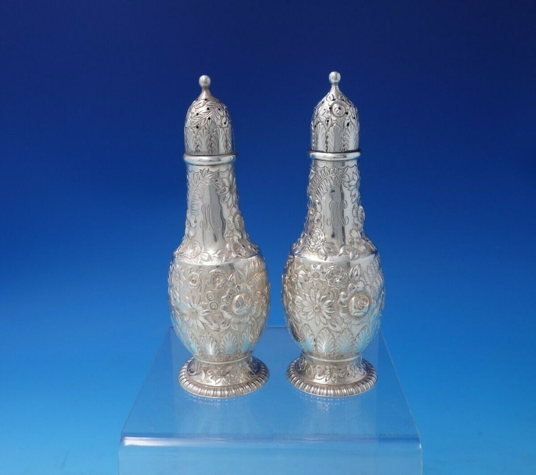 Tiffany & Co Repousse Sterling Silver Salt Pepper Shaker Set 2pc: Tiffany & Co Repousse Sterling Silver Salt Pepper Shaker Set 2pc Enhance your dining experience with this exquisite Repousse salt and pepper shaker set from Tiffany & Co. Crafted from high-quality ste