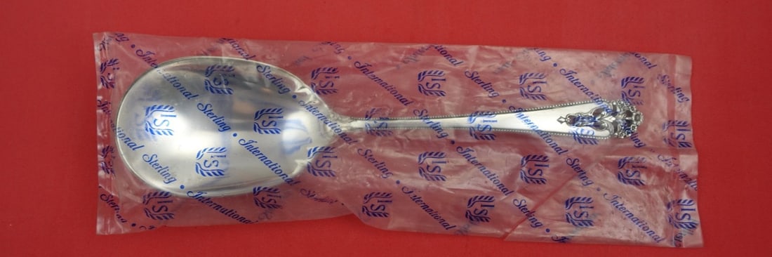 International Sterling Queens Lace Berry Spoon 9 1/4 Factory Sealed: International Sterling Queens Lace Berry Spoon 9 1/4 Factory Sealed This exquisite serving fork features the elegant Queens Lace pattern by International Sterling, also known as Queen's Lace. Crafted
