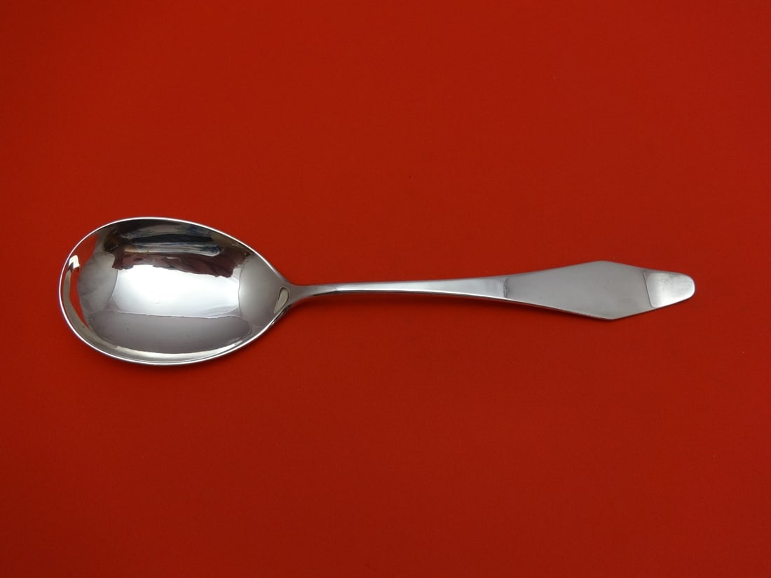 Old Newbury Crafters Sterling Silver Berry Spoon 9 1/4" Serving Spoon: Old Newbury Crafters Sterling Silver Berry Spoon 9 1/4" Serving Spoon This elegant serving spoon is crafted from high-quality sterling silver by Old Newbury Crafters. Measuring 9 1/4" in length, this