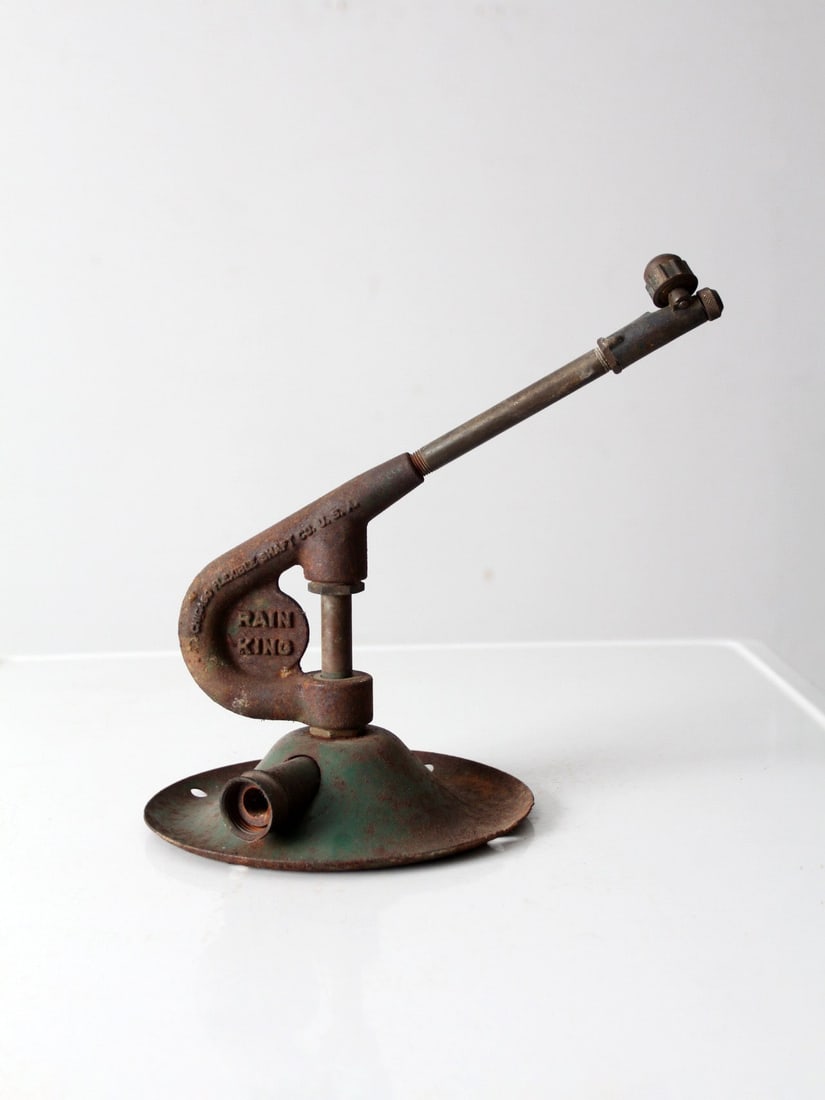 Antique Rain King Model G Sprinkler by Chicago Flexible Shaft Co: Antique Rain King Model G Sprinkler by Chicago Flexible Shaft Co Introducing the Antique Rain King Model G lawn sprinkler, a remarkable piece of early 20th-century design crafted by the Chicago Flexib